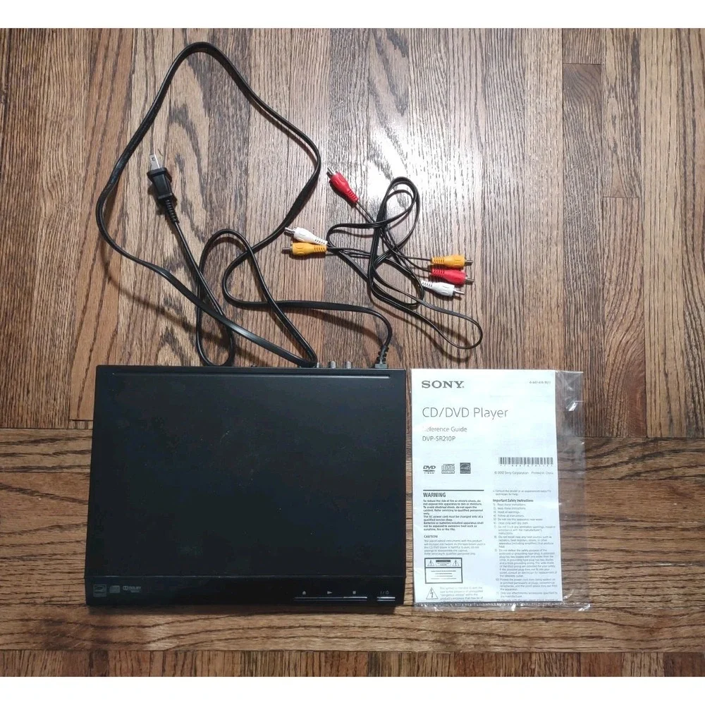 Sony DVP-SR210P Ultra Slim CD/DVD Player - Powers On / Ejects Includes Manual